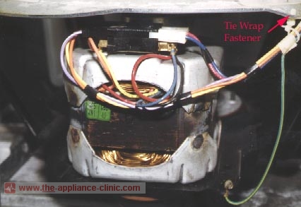 Locate motor wire harness clip